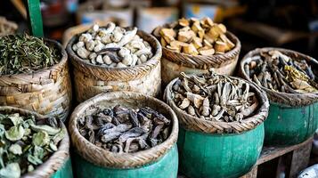 Dried Herbs and Spices in Woven Baskets at a Market. A close up view of various dried botanicals in rustic containers. photo