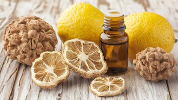 Aromatic Lemon Essential Oil with Dried Lemons and Walnuts. photo