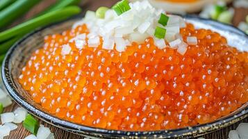 Close Up of Salmon Roe with Chopped Onions. A delectable image of fresh salmon eggs garnished with finely diced white and green onions. photo