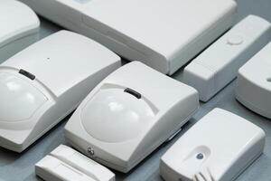 set of security systems for the house on a gray background close-up photo