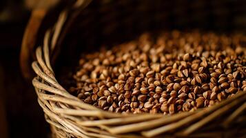 Close Up of Buckwheat Groats in a Rustic Wicker Basket. photo
