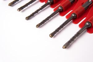 Drill bit for brick and concrete borer for perforator on a white background. industrial punchers. photo