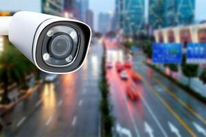 Closeup of traffic security camera surveillance CCTV on the road in the big city. photo
