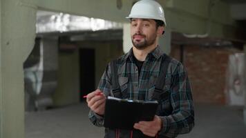 Angry furious man Caucasian guy builder stressed mad control building problem construction shout foreman inspector architectural project trouble engineering industry male architect engineer write plan video