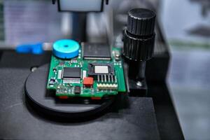 Digital microscope inspection system for checking the quality of electronic PCB circuit boards selective focus at factory photo