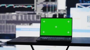 In a business finance space, pc screen showing isolated chroma key to help the strategy planning with financial trends. Representing high tech artificial intelligence and productivity. Camera A. video