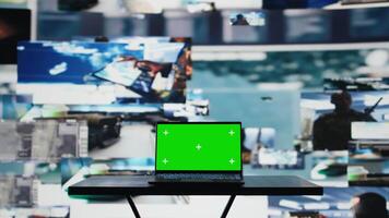 Modern army command center with laptop running chroma key screen, defense forces tactics created with satellite surveillance data for war planning. Global safety operations. Camera B. video