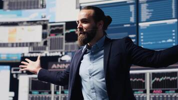 Visionary business CEO speaking at international convention for finance, hosting live event conference. Public speaker shares professional knowledge and insight with participants. Camera A. video