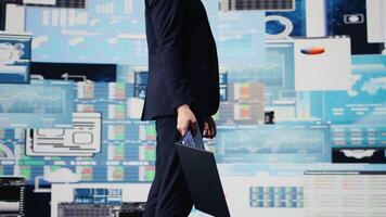Business administrator planning a new strategy with support from performance metrics, building international organization. Using dashboards and projections for new growth ideas. Camera B. video