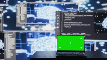 PC showcasing chroma key display next to AI neural networks system, machine learning for practicing predictive analytics and cloud computing. Implementing artificial intelligence brain. Camera B. video