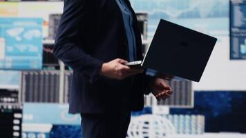 Young startup entrepreneur uses digital materials and analytics to improve development models for fruitful management decisions. Optimizing performance metrics with complexity. Camera A. video