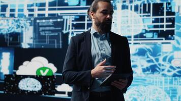Entrepreneur presenter hosting live conference to highlight AI usage in business growth, demonstrating the use of neural networks system and machine learning. Fintech event. Camera A. video
