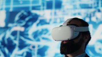 IT engineer works with vr headset and artificial intelligence brain, employs algorithmic programming within a futuristic interface for digital transformation and deep learning. AI ethics. Camera A. video