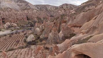 Rocky mountain range with a road running through it video