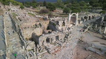 Diagonal aerial view of library ruins and ancient streets in Ephesus video