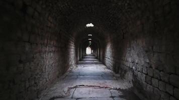 Ancient stone corridor of Asklepion with lighted exit in Bergama video