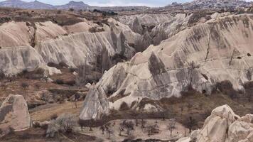 Aerial view of Cappadocia's deep eroded valleys and ridges video