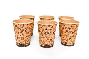 A Set of Patterned Paper Cups on a White Background, Perfect for Serving Coffee or Tea photo