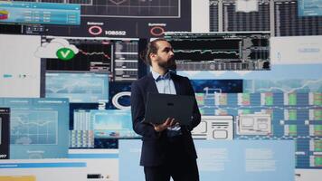 Data driven planning helps this professional to build a successful strategy for global business development. Using charts on dashboard and projections to guide his leadership ideas. Camera B. video