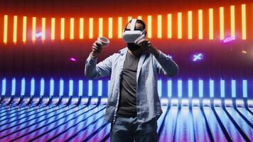 Young person with high tech VR gadget in a neon lit night scene, using virtual reality glasses for digital inspiration through artistic vision. Glowing reflections of aesthetics, visuals. Camera B. video