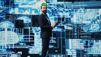 Entrepreneur uses laptop to review artificial intelligence brain system on dashboard, using high tech data visualization for coding, analytics and deep learning. Strategic growth. Camera B. video