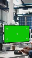 Vertical Professionals brainstorming solutions with mockup screen in solar facility, advancing industrial goals through collaboration and corporate responsibility. Team of engineers share insight. Camera A. video