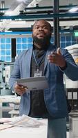 Vertical Startup founder corporate leader giving a speech on renewable energy investments, presenting the photovoltaics factory business to obtain funding. Automated engineering systems. Camera A. video