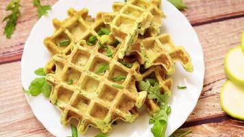 Natural vegetable waffles suitable for healthy eating on a wooden table video