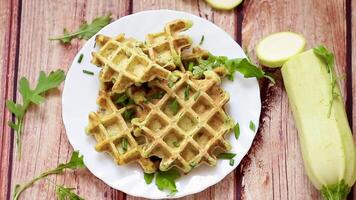 Natural vegetable waffles suitable for healthy eating on a wooden table video