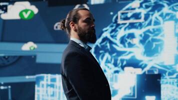 Tech savvy businessman employing AI brain data visualization, exploring algorithmic thinking and machine learning through neural networks system. Virtual intelligence in the digital age. Camera A. video