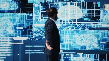 Company leader interacting with a digital AI brain symbolizing web platforms, using machine learning and algorithm development for intelligent innovation and future tech strategy. Camera B. video