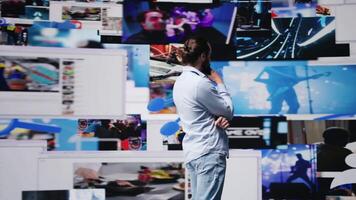 Successful young adult enjoying life on social media platforms, celebrating his achievement in gaining followers and dominating the digital world of social networking. Empowerment. Camera B. video