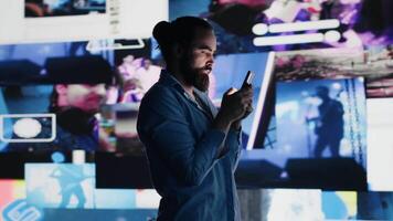 Smartphone user addicted by social media content consumption and obsessive doomscrolling that can trigger anxiety and harmful self esteem issues in the digital world. Overuse isolation. Camera A. video