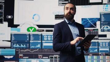 Business expert reflecting on monthly performance metrics on dashboards for a new growth strategy, analyzing the financial situation and reports of the company. Digital tools. Camera B. video