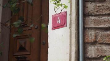 Distinctive number on rustic wall in charming area video
