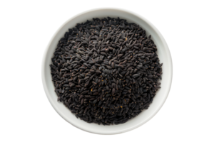 Black cumin seeds in white bowl isolated on transparent background png