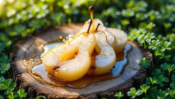 Poached Pear Slices on Wood with Syrup and Clover Background photo