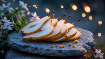 Sliced Pears Arranged on Stone Slab with Floral Background and Lights photo