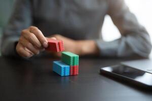 Global Shipping a person is building container with colored container photo