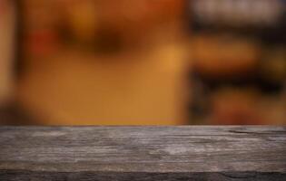 wooden table top with blurred background photo