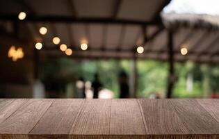 wooden table top with blurred background. photo