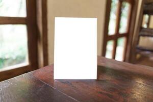 Menu mock up blank for text on a table. photo