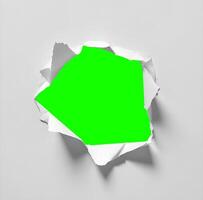 a hole in the paper with a greenscreen background photo