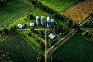 Aerial view of farm and silos in rural area photo