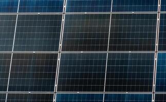 Close-up view displaying solar panels arranged in a grid-like structure, showcasing sustainable energy production technology photo