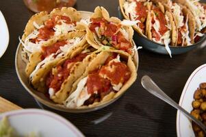 Close-Up View of Freshly Made Vegetarian Tacos Served in a Rustic Style photo