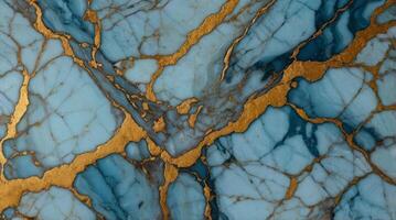 A close up of a blue marble with gold paint photo