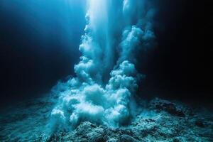 Underwater volcanic eruption creating a large plume of smoke in deep ocean photo