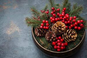 Christmas centerpiece with pine cones, red berries and fir branches creating festive atmosphere photo
