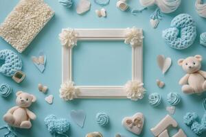 Baby boy nursery decoration surrounding empty frame on light blue background photo